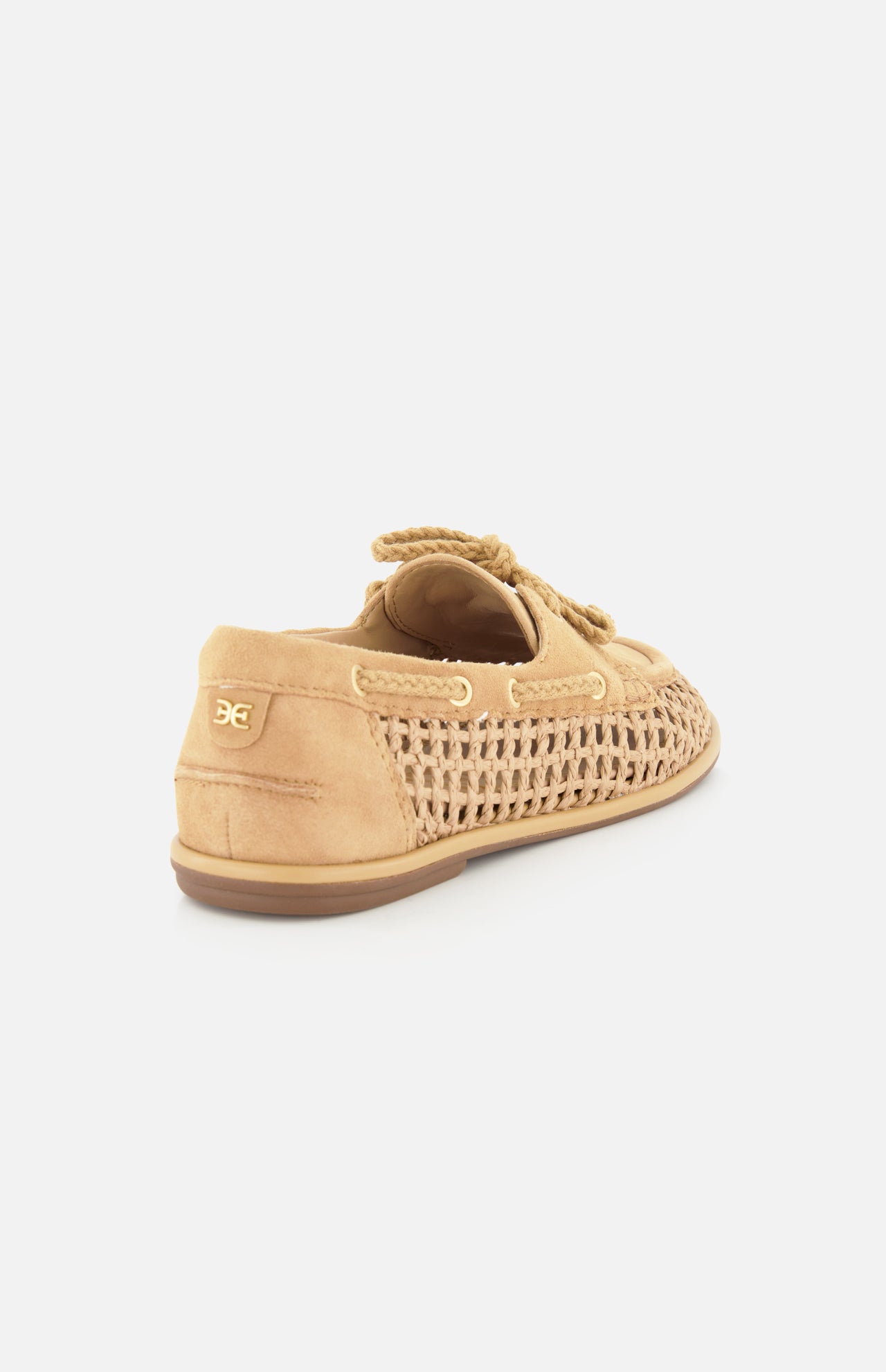 The SAM EDELMAN Bria Woven Loafer is a tan slip-on featuring woven side panels, lace detail on top, a rubber sole, and a small gold logo on the heel, displayed against a plain white background.