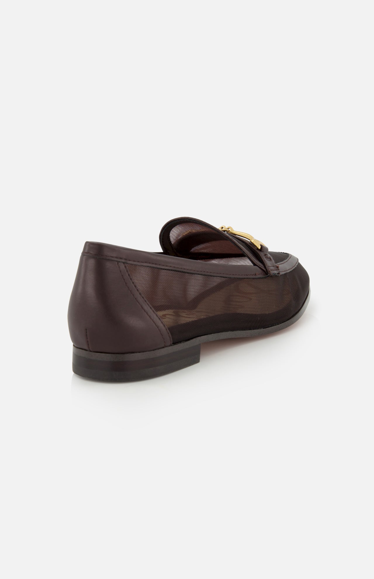 The SAM EDELMAN Loraine Mesh Equestrian-inspired Loafer is a dark brown shoe with a gold buckle bit, low black heel, and sheer mesh panel, shown from a rear side angle on a white background.