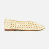 The Shira Woven Leather Flat by SAM EDELMAN is a beige slip-on with a pointed toe and open weave pattern, shown in profile on a white background.
