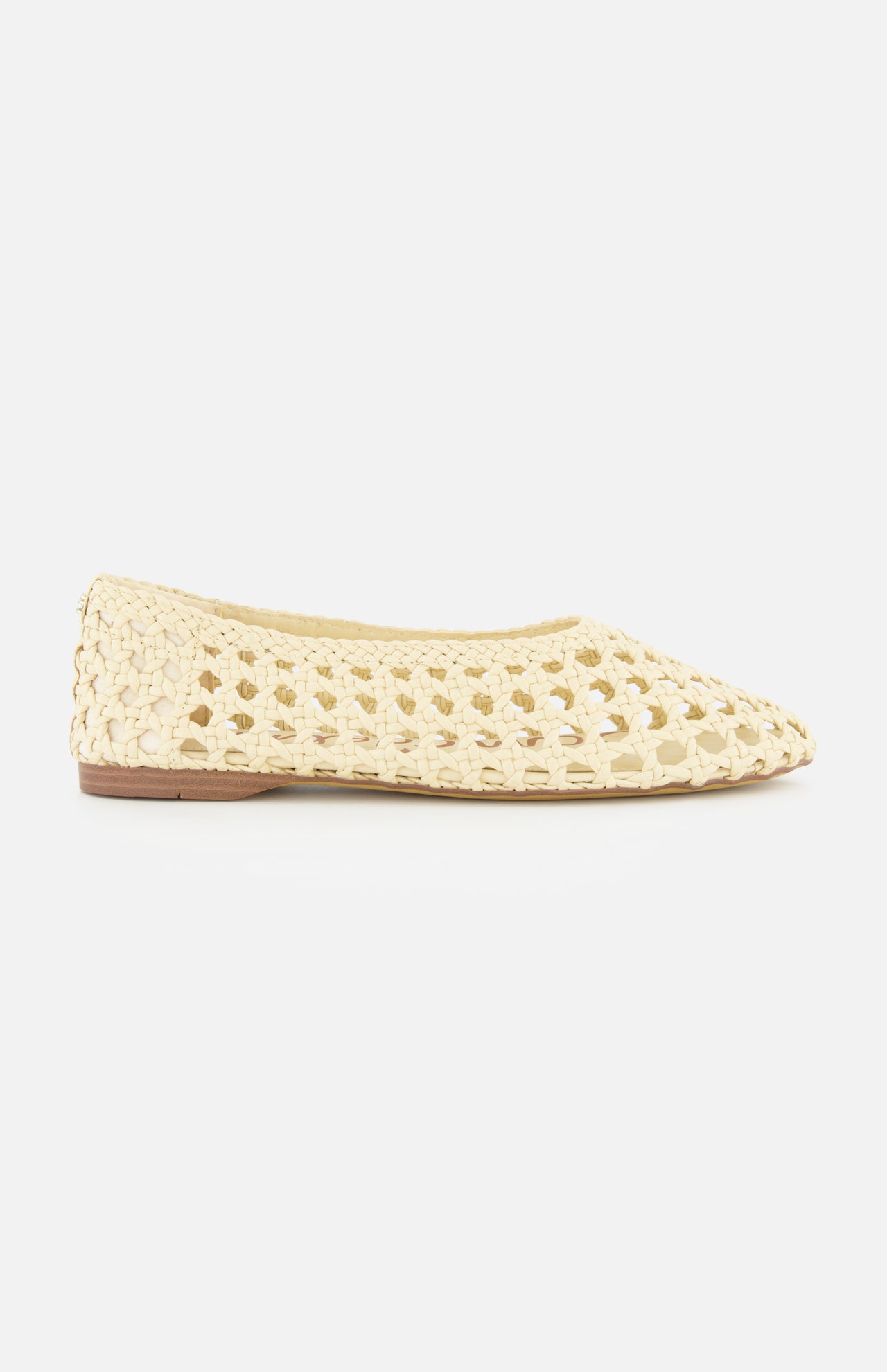 The Shira Woven Leather Flat by SAM EDELMAN is a beige slip-on with a pointed toe and open weave pattern, shown in profile on a white background.