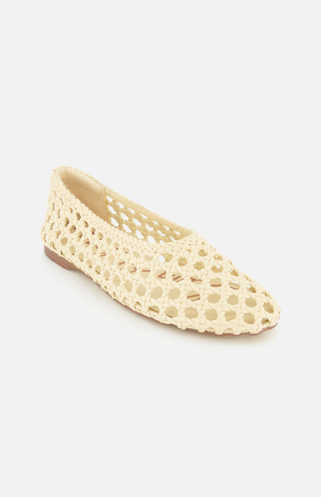 The Shira Woven Leather Flat by SAM EDELMAN is an off-white, pointed-toe slip-on with an open, airy woven design, shown on a white background.