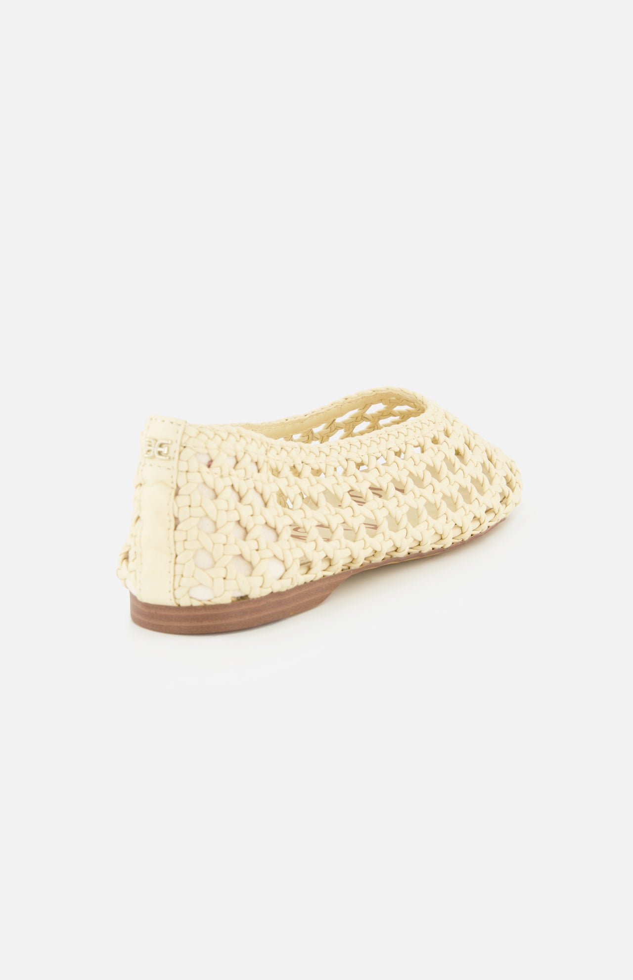 The SAM EDELMAN Shira Woven Leather Flat is an off-white slip-on with a square toe, closed heel, and open-weave design, shown from the back and slightly to the side on a plain white background.