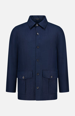 The SARTORIO Linen Flap Pocket Overshirt in navy blue features a collar, long sleeves, and two front flap pockets, shown against a plain light gray background.