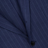 Close-up of the SARTORIO Pinstripe Wool Suit, featuring a navy jacket with light blue stripes, black button, pocket, lapel details, and crafted in Italy from premium virgin wool.