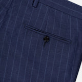 Close-up of the back pocket on SARTORIO's Pinstripe Wool Suit pants, featuring a single black button and a belt loop above, showcasing meticulous craftsmanship.