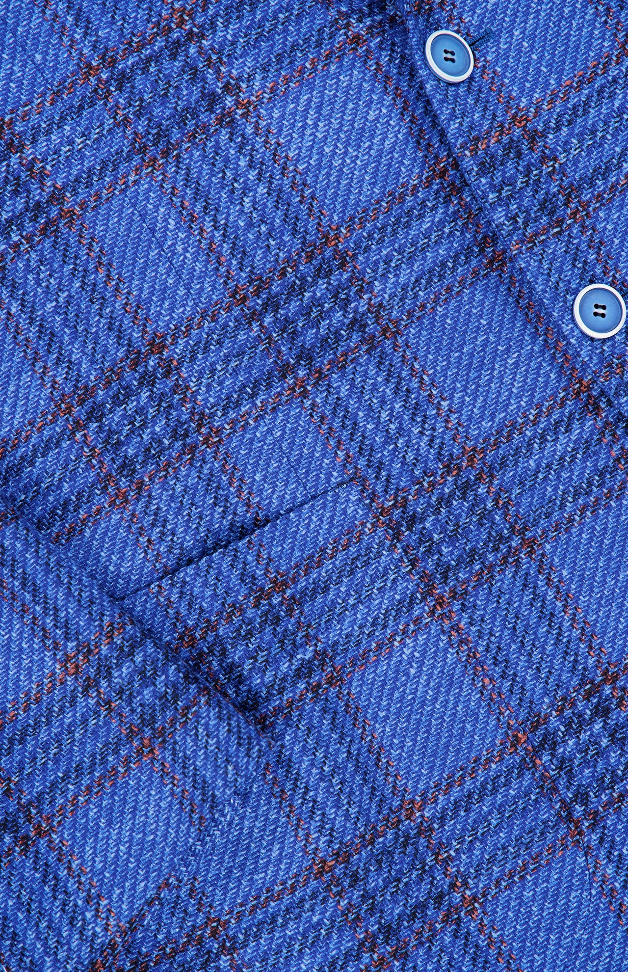 Close-up of the SARTORIO Wool Blend Plaid Sportcoat, showcasing blue plaid fabric with red and white accents and two blue buttons.