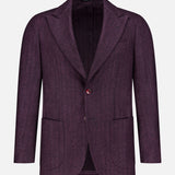 The SARTORIO Wool Herringbone Sportcoat features a purple textured finish with a subtle herringbone pattern, notch lapels, two front patch pockets, and a single-breasted design, displayed on a plain white background.