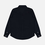 The Allen Denim Shirt by SAVAS is a black, long-sleeve button-up shirt crafted from Japanese selvedge denim. Featured here laid flat on a plain white background, it is shown from the back to highlight its pointed yoke detail and buttoned cuffs. Expertly made in Los Angeles, this shirt exemplifies quality construction and timeless style.