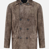 The SAVAS Condor Calf Suede Shearling Collar Peacoat is a brown suede double-breasted men’s coat with a wide collar, button closure, two side flap pockets, and two slanted chest pockets. It features a luxurious removable shearling collar and is displayed on a plain white background.