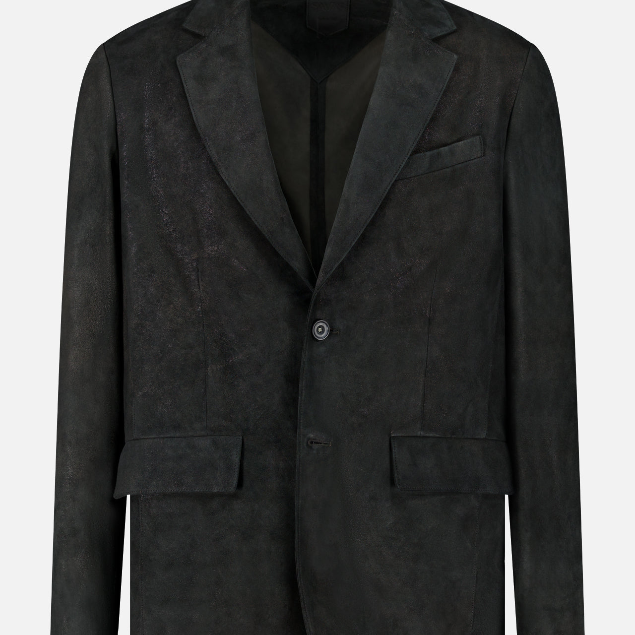 The Owens Lamb Leather Blazer by SAVAS, shown against a plain white background, features notched lapels, two buttons, flap pockets, and a breast pocket. Handcrafted in an artisanal style from black lamb leather.