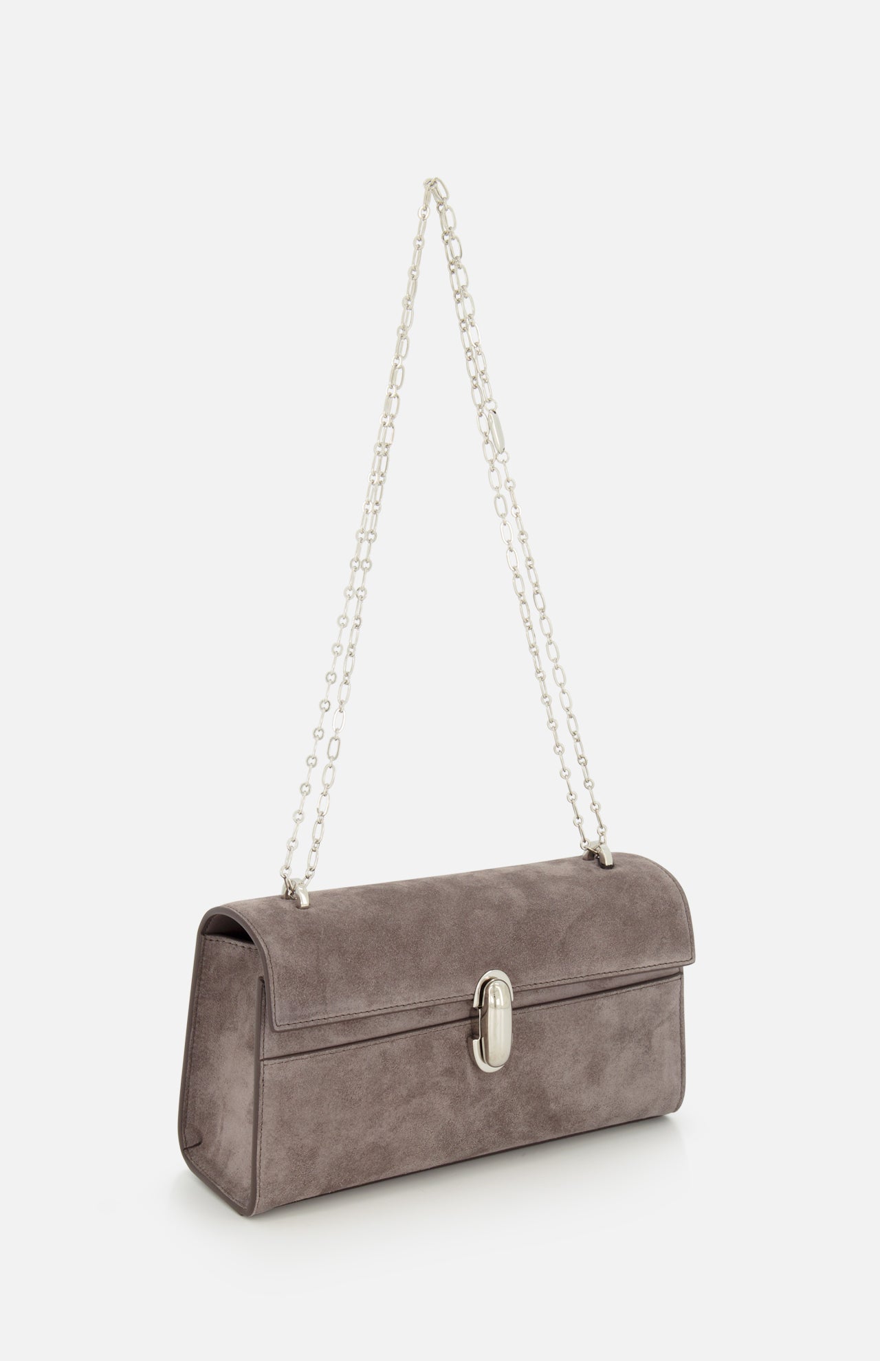 The Symmetry Chain Pouchette Bag by Savette is a taupe rectangular suede handbag accented with a silver chain strap and a sleek turnlock closure, shown against a white background.