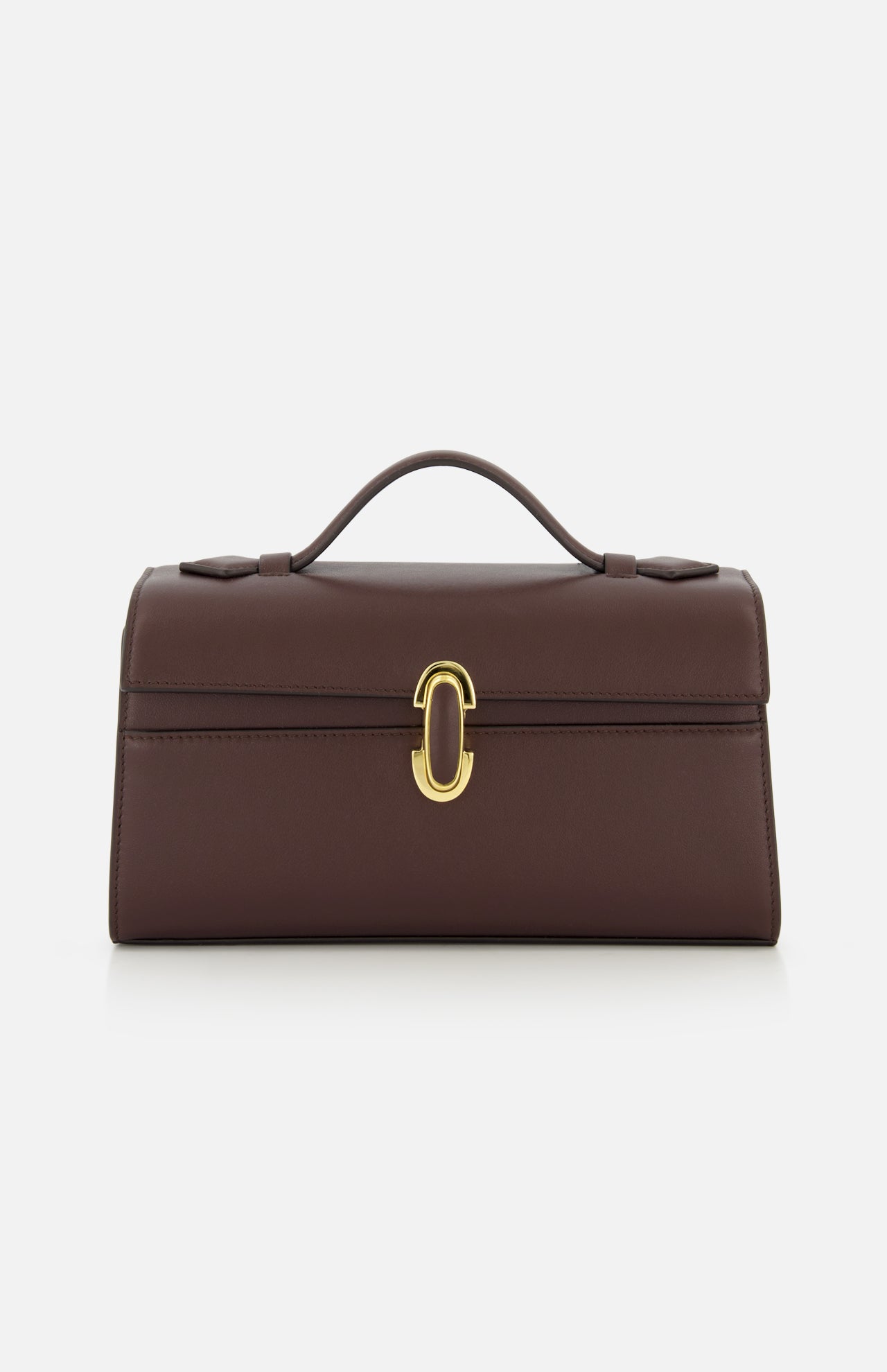 The Symmetry Pouchette Bag by Savette is a brown leather handbag that exudes quiet luxury, featuring a short handle, rectangular silhouette, and elegant gold clasp on the front. Set against a plain white background, this timeless accessory is expertly made in Italy.