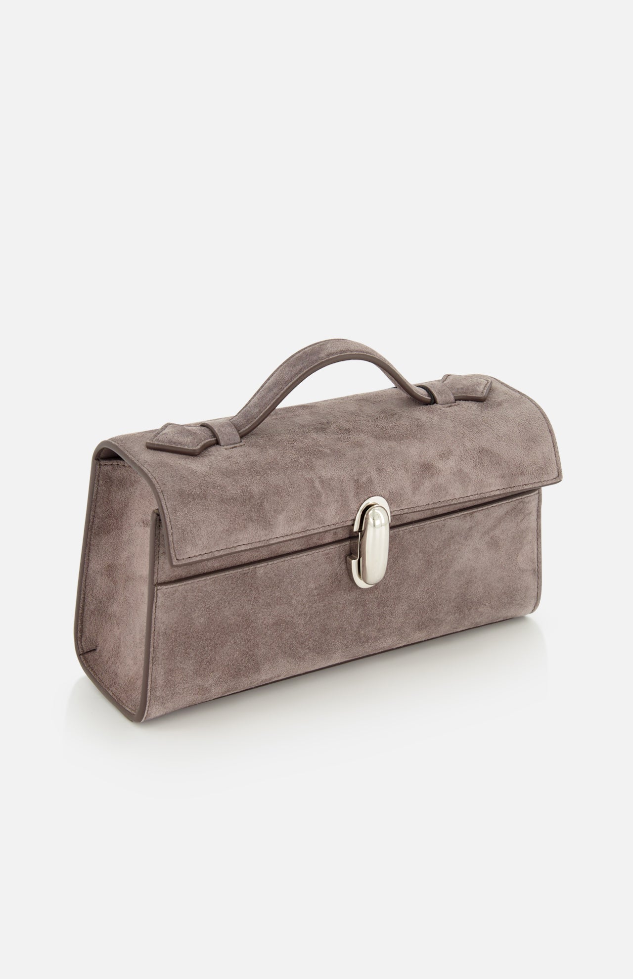The Symmetry Pouchette Bag by Savette is a rectangular smokey grey suede handbag, crafted in Italy, featuring a top handle and a silver clasp, displayed against a plain white background.