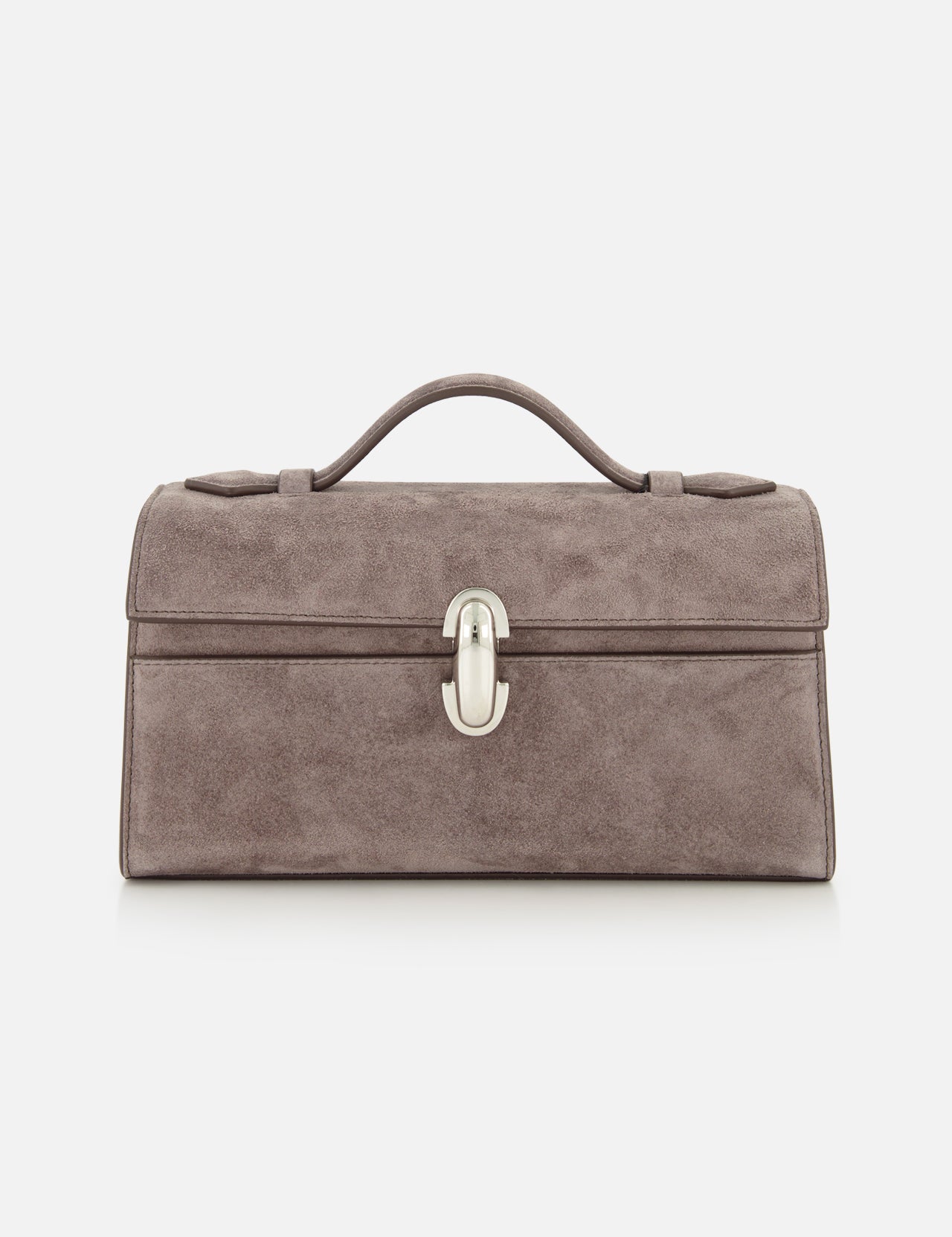The Symmetry Pouchette Bag by Savette is a taupe suede handbag featuring a rectangular silhouette, top handle, and silver front clasp, expertly crafted in Italy and photographed against a white background—a refined example of quiet luxury.