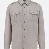 The SEASE Glen Plaid Wool Overshirt features a light brown Prince of Wales check, with long sleeves, two flap chest pockets, and shoulder epaulettes. This versatile business travel shirt is shown against a plain white background.