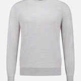 The Lasca Long Sleeve Sweater by SEASE is shown in light gray on a plain white background, displayed from the front with no visible branding or patterns. Exemplifying classic Italian knitwear style, this refined sweater offers understated elegance and exceptional comfort.