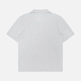 The SEASE Linen Pocket Polo Shirt, shown from the back against a white background, is a light grey polo featuring a Johnny collar and crafted from a linen-blend fabric.