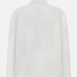 Back view of the SEASE Spring Lifetime Drawcord Jacket, a minimalist white outerwear piece with a collar, shown on a white background. The design features no visible buttons, pockets, or decorative details.