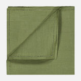 Sage green Jour Venise Hemstich Linen Pocket Square with a decorative hemstitched border, shown folded at the corner.