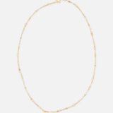 The SPINELLI KILCOLLIN Gravity Chain 20" Necklace features fine gold links and a small clasp, elegantly displayed in a loose oval on a white background—ideal for layering or pairing with modular jewelry.