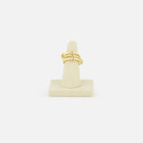 The SPINELLI KILCOLLIN Jovie Double Pave Ring is shown upright on a beige ring stand, set against a plain white background.