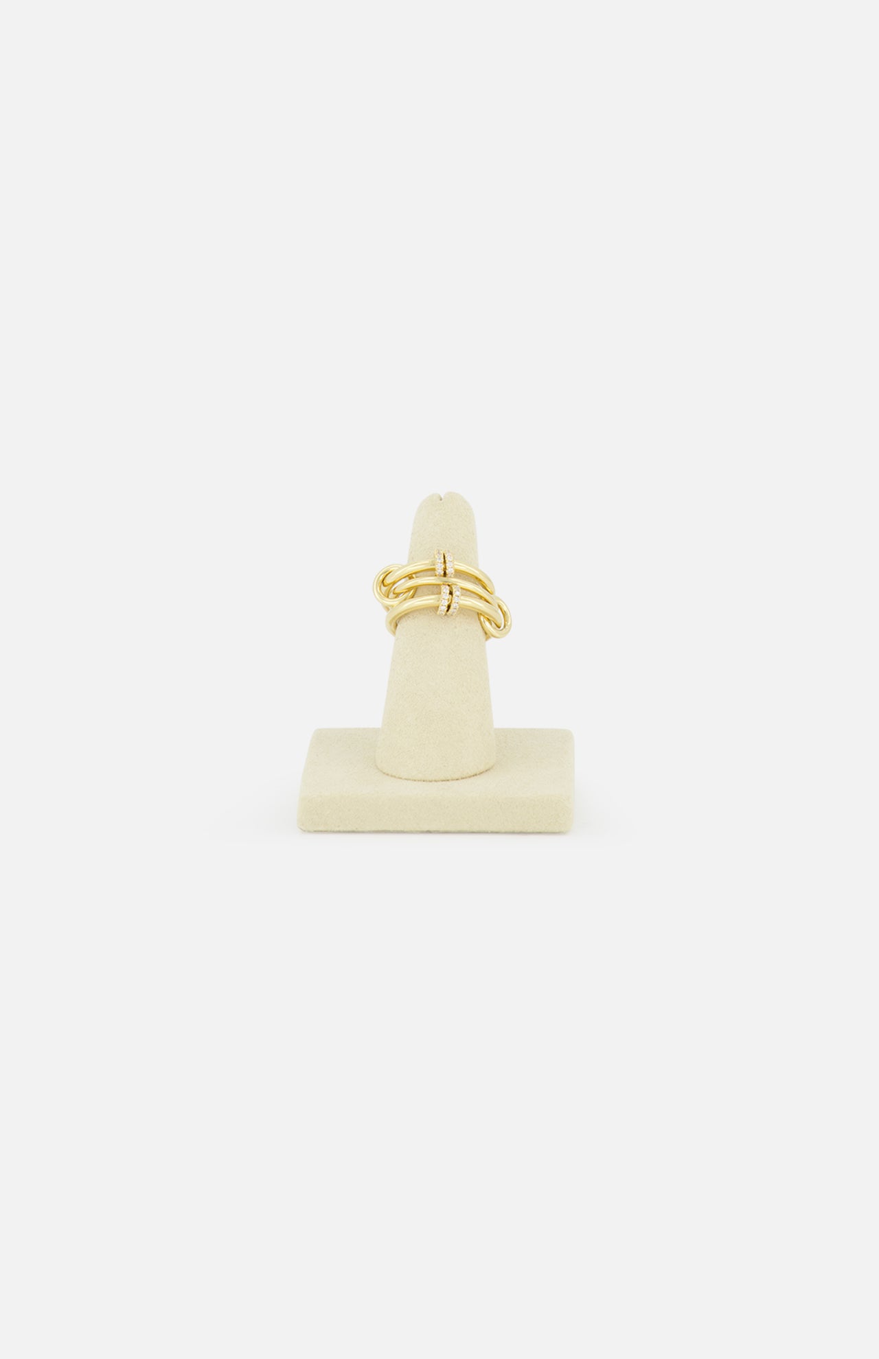 The SPINELLI KILCOLLIN Jovie Double Pave Ring is shown upright on a beige ring stand, set against a plain white background.