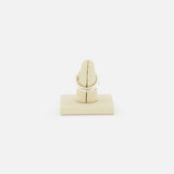 The Jovie Double Pave Ring by SPINELLI KILCOLLIN is shown upright on a beige ring holder against a plain white background, highlighting its elegant sterling silver design.