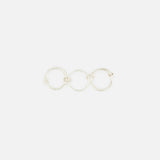 The Jovie Double Pave Ring by SPINELLI KILCOLLIN features interlinked sterling silver bands in a minimalist style, reflecting the brand’s signature elegance against a simple white background.