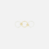 The Solarium 3 Band Ring by SPINELLI KILCOLLIN features three interlocking bands—a yellow gold center band flanked by two sterling silver bands—shown on a plain white background.