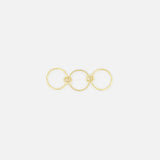 The SPINELLI KILCOLLIN Sonny Pavé Band Ring, crafted in yellow gold with three interlocking circles connected by decorative knots, is shown against a plain white background.