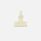 The SPINELLI KILCOLLIN Sonny Pavé Band Ring in sterling silver is shown upright on a beige ring holder, set against a plain white background.