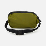 The STONE ISLAND Coated Nylon Belt Bag is crafted from durable coated nylon and features a black adjustable strap with a plastic buckle. Displayed against a plain white background, this bag offers a minimalist design with a top zipper closure, making it the perfect complement to any streetwear outfit.