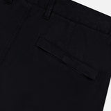 Close-up of the STONE ISLAND Cotton Stretch Cargo Trouser Pants in black, highlighting the waistband, belt loops, and a single flap back pocket against a plain white background—an essential addition to any streetwear collection.
