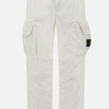 STONE ISLAND Cargo Trousers featuring large side pockets, button and zip closure, and a signature black patch with yellow-green emblem on the left pocket, shown against a plain white background—ideal for upgrading your sportswear look.