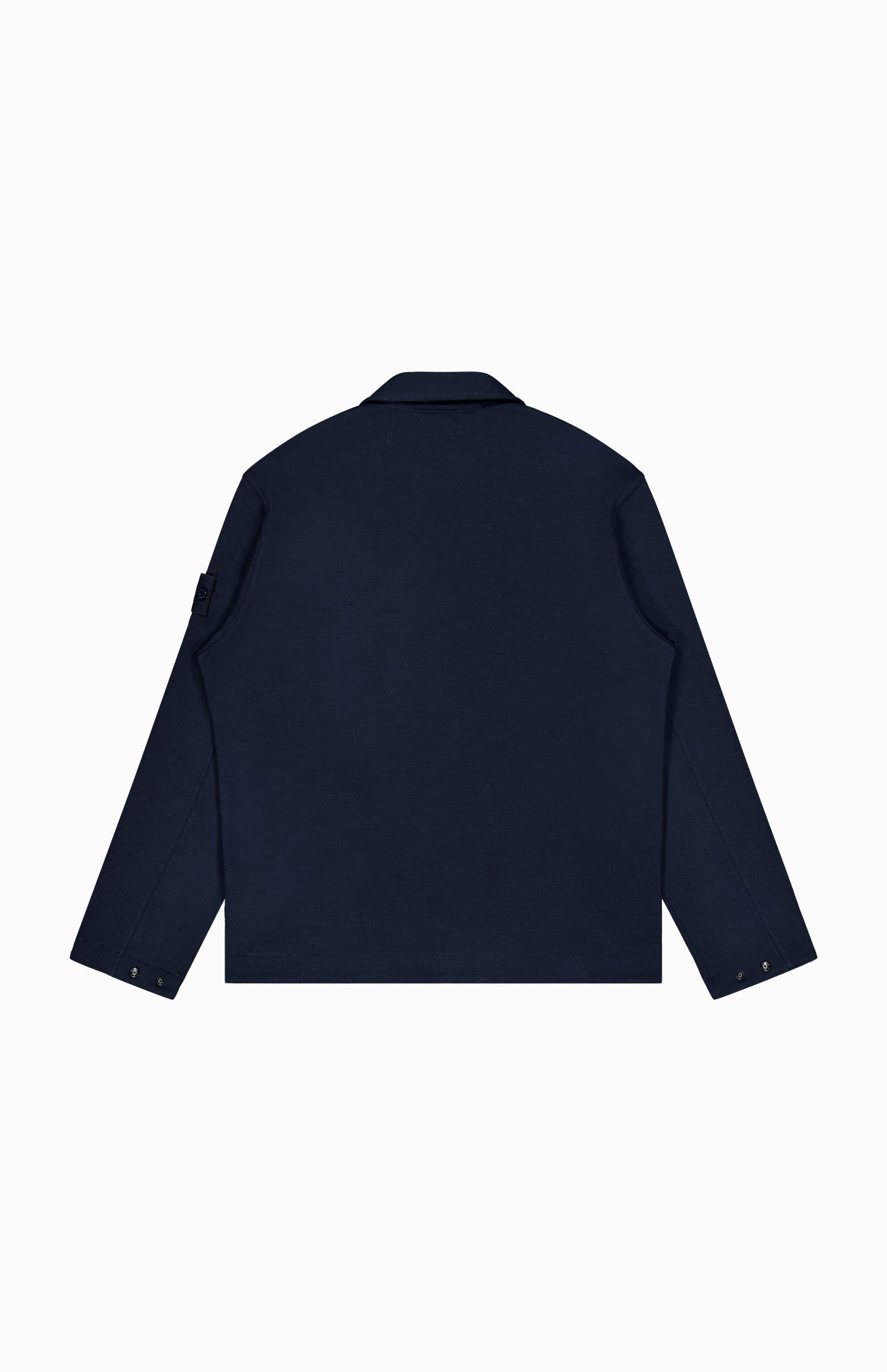 A STONE ISLAND Coach Full Zip Jacket in navy blue is shown from the back, featuring a straight hem, collar, buttoned cuffs, and a small pocket on the upper left sleeve. The wool-cotton jacket stands out elegantly against the plain white background.