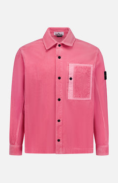 The STONE ISLAND Corduroy Chest Pocket Overshirt is a pink, long-sleeve button-up with a large chest pocket and black sleeve patch, inspired by classic overshirt style. Shown on a white background and perfect for streetwear.