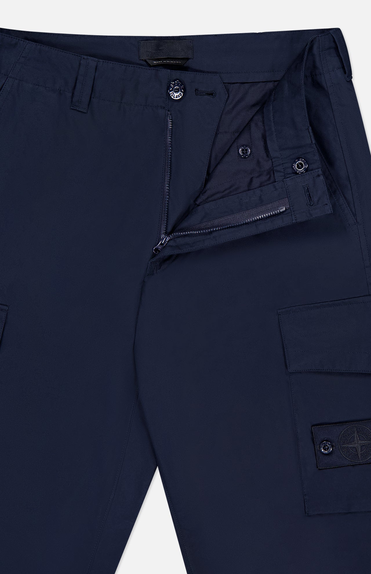 STONE ISLAND Ghost Cargo Trouser Pants in navy feature a partially unzipped fly, button closure, belt loops, and side cargo pockets with a buttoned flap and stitched logo patch—perfect for men's sportswear looks.