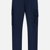 STONE ISLAND Ghost Cargo Trouser Pants in navy blue, featuring two side cargo pockets and belt loops—a stylish upgrade for any men’s sportswear collection. Displayed on a plain white background.