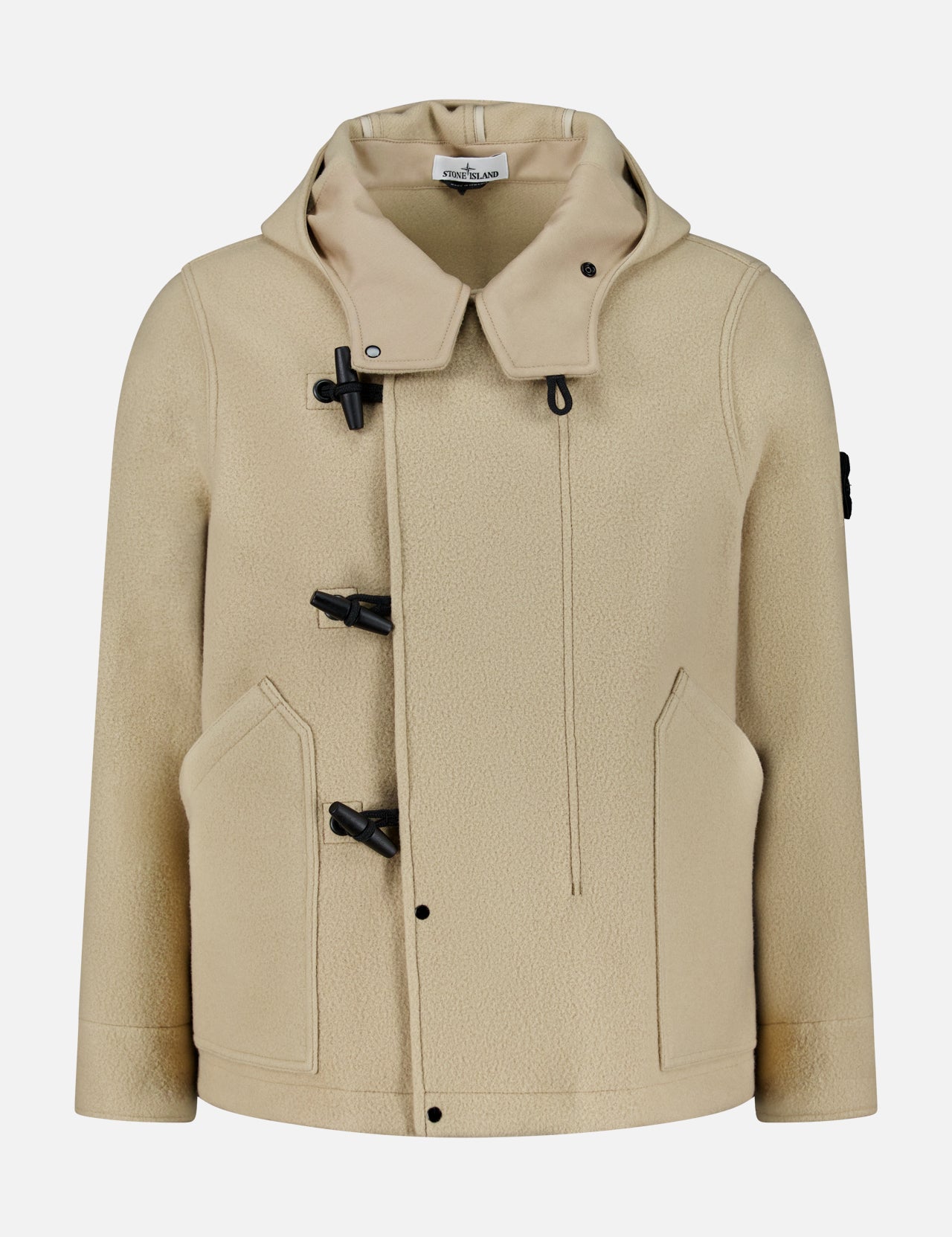 The STONE ISLAND Hooded Toggle Jacket in beige features black toggle closures, front pockets, and a high collar, displayed on a plain white background.