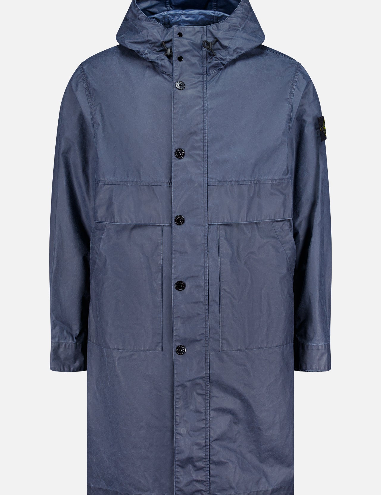 The STONE ISLAND Long Waxed Coating Parka Coat is a navy spring jacket with a hood, inspired by the brand’s technical parka designs.