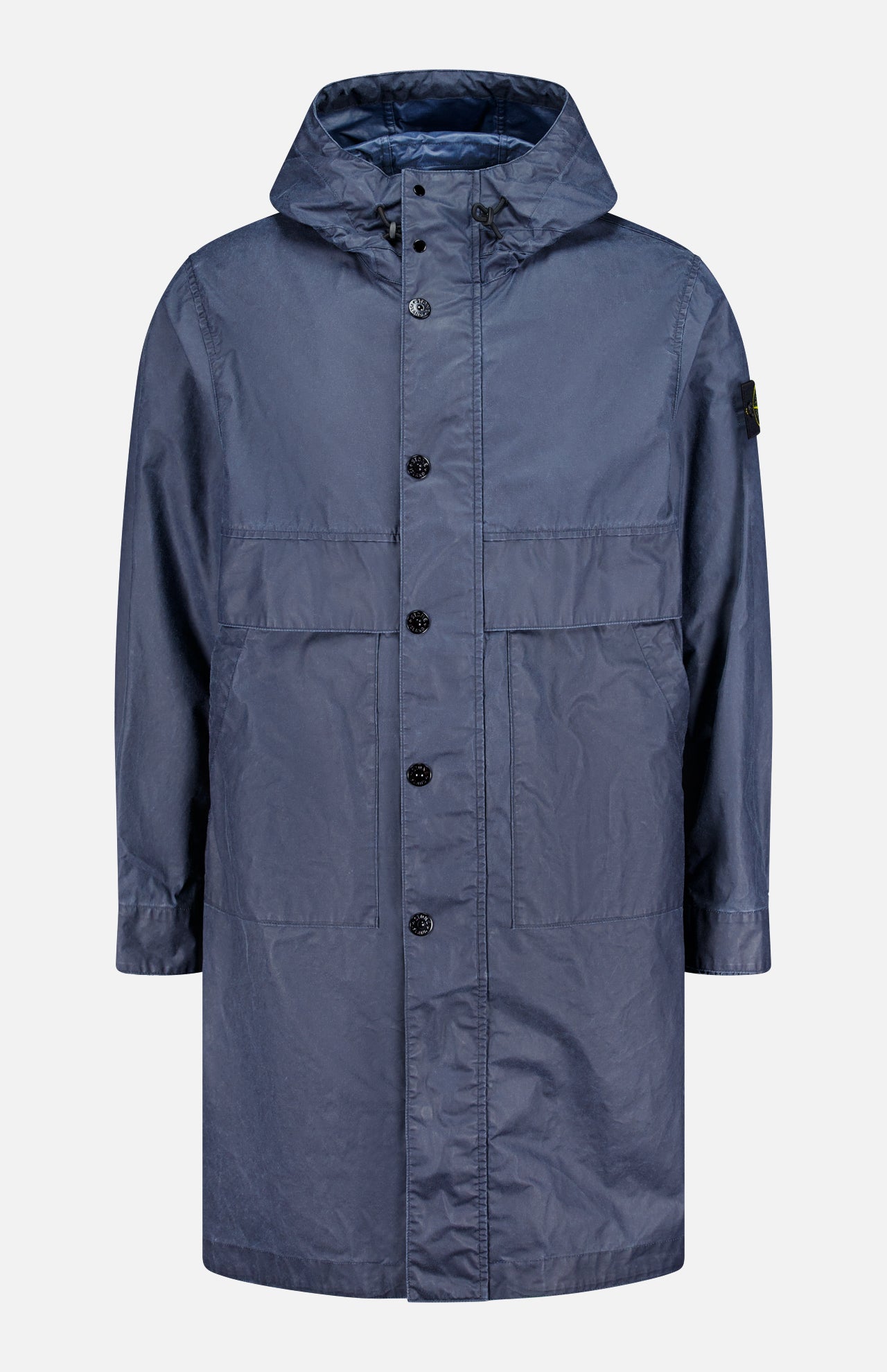 The STONE ISLAND Long Waxed Coating Parka Coat is a navy spring jacket with a hood, inspired by the brand’s technical parka designs.