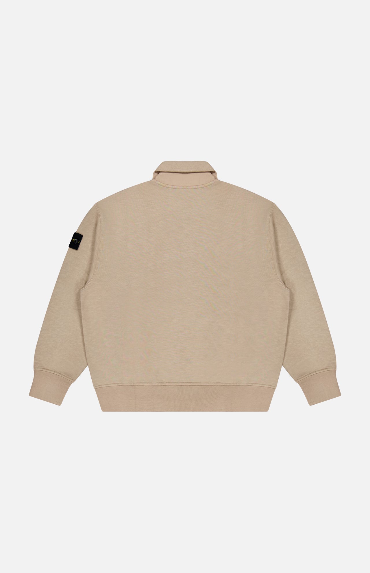 Long Sleeve Polo Pullover Sweatshirt by STONE ISLAND shown from the back, with a high collar and black Stone Island patch on the upper left sleeve, set against a plain white background.