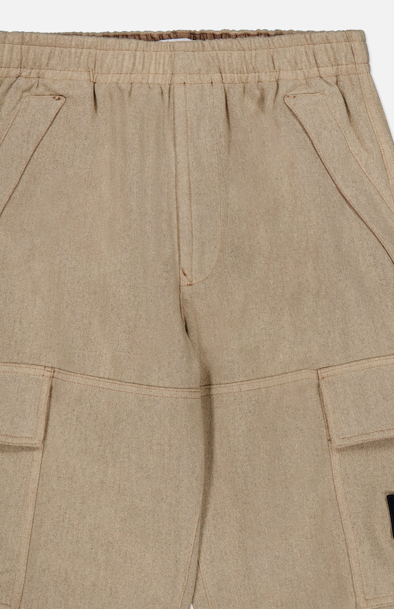 The STONE ISLAND Loose-Fit Cargo Jogger Pant features a soft, subtly textured fabric and is designed with an elastic waistband, front slant pockets, and large flap pockets on the thighs—offering comfortable sportswear style inspired by classic Stone Island joggers.