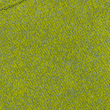 Close-up of the STONE ISLAND Maglia Speck Crewneck Sweater, featuring textured knit fabric interwoven with green and yellow threads and a visible brand label near the collar—a testament to the brand’s innovative sportswear design.