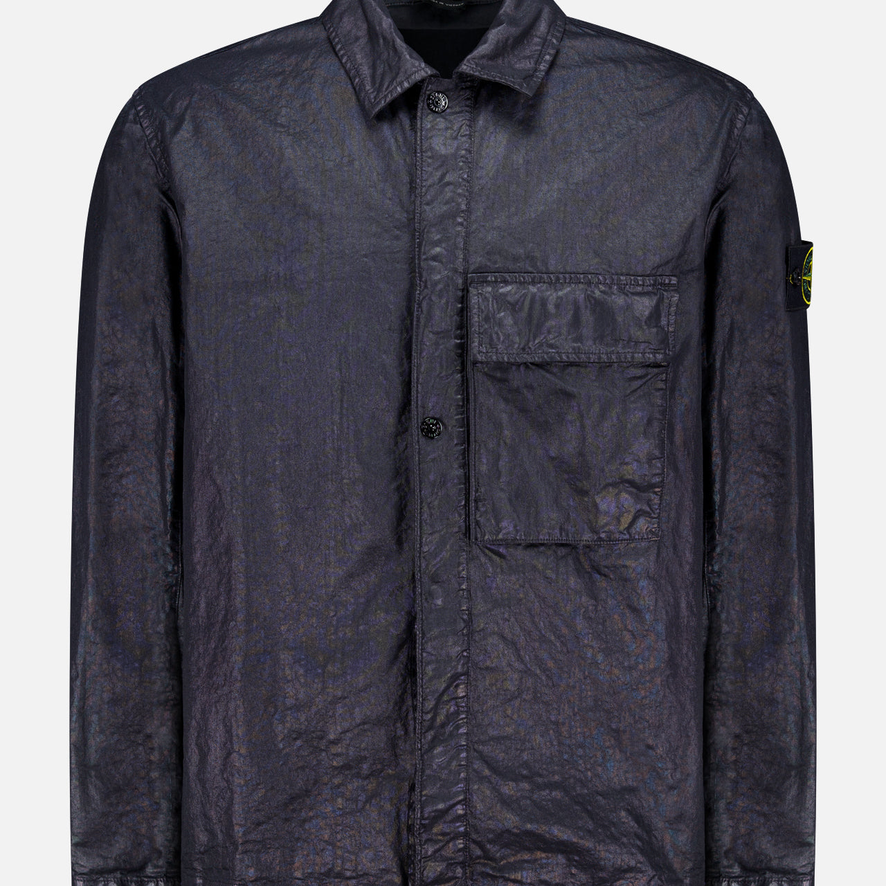 The STONE ISLAND Crinkled Pocket Overshirt in black features crinkled fabric, a collar, a front pocket, and a small logo patch on the upper left sleeve, displayed against a plain background.