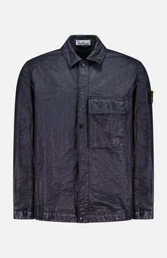 The STONE ISLAND Crinkled Pocket Overshirt in black features crinkled fabric, a collar, a front pocket, and a small logo patch on the upper left sleeve, displayed against a plain background.