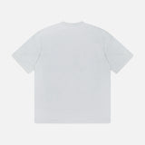 A Reflected Short Sleeve T-Shirt by STONE ISLAND is laid flat, back side up, on a light gray background. The plain white tee features a classic, pattern-free design with no visible logos—ideal for effortless streetwear style.