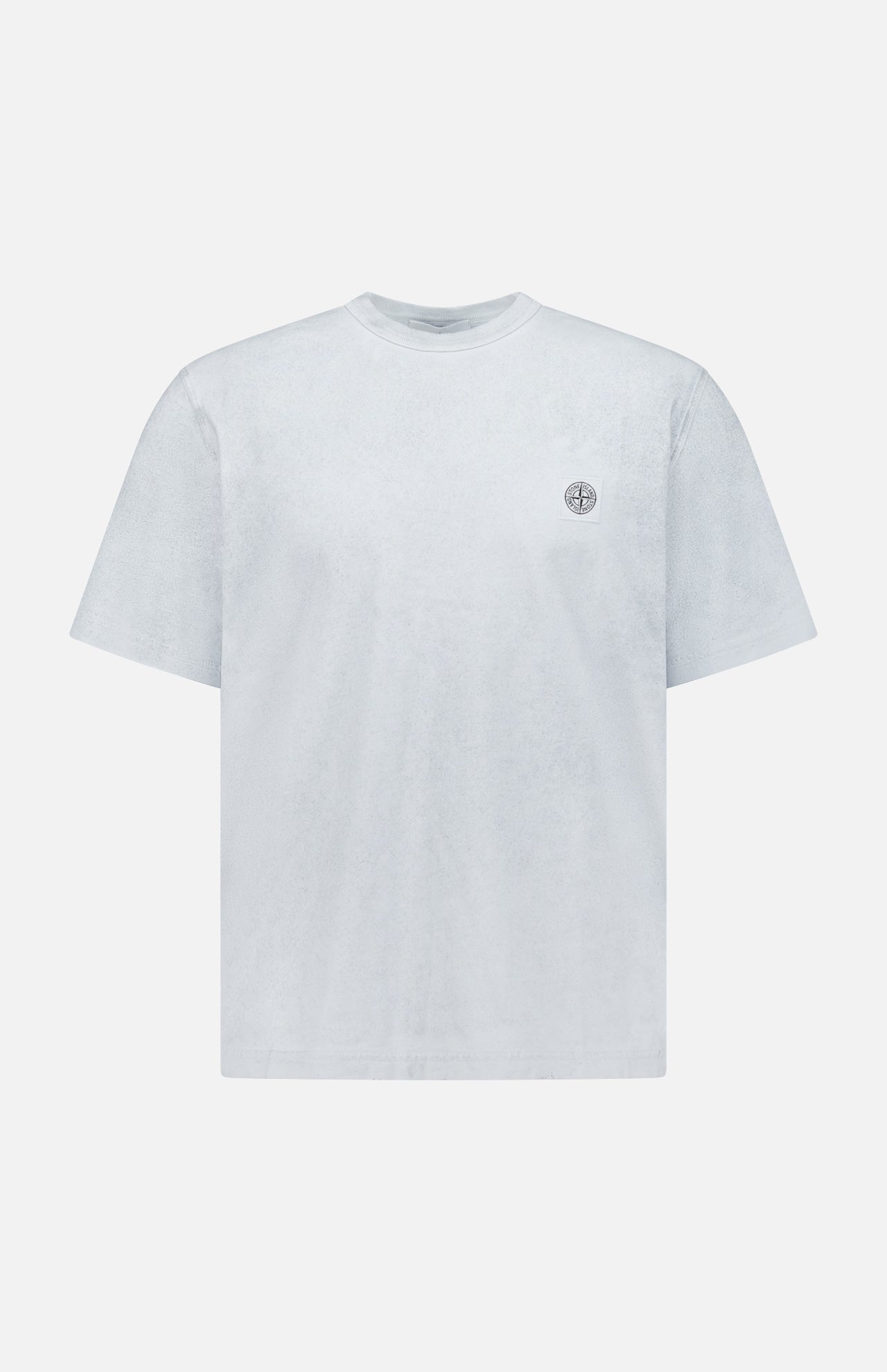 The STONE ISLAND Reflected Short Sleeve T-Shirt in light grey features a round neck and small circular chest logo—a minimalist streetwear staple, shown on a white background.