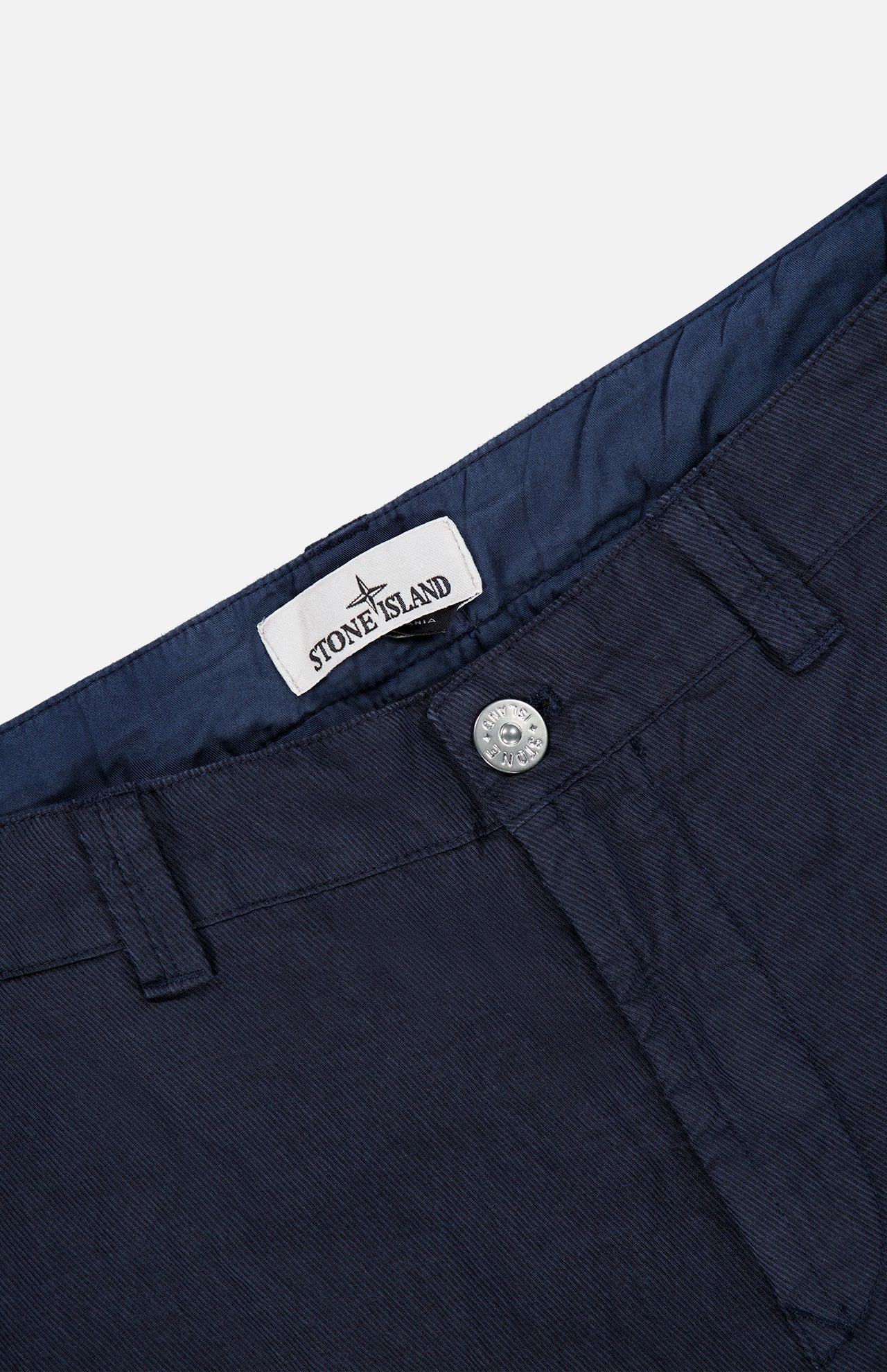 Close-up of the waistband of Stone Island Regular-Fit Trousers, featuring a button closure and a brand label.