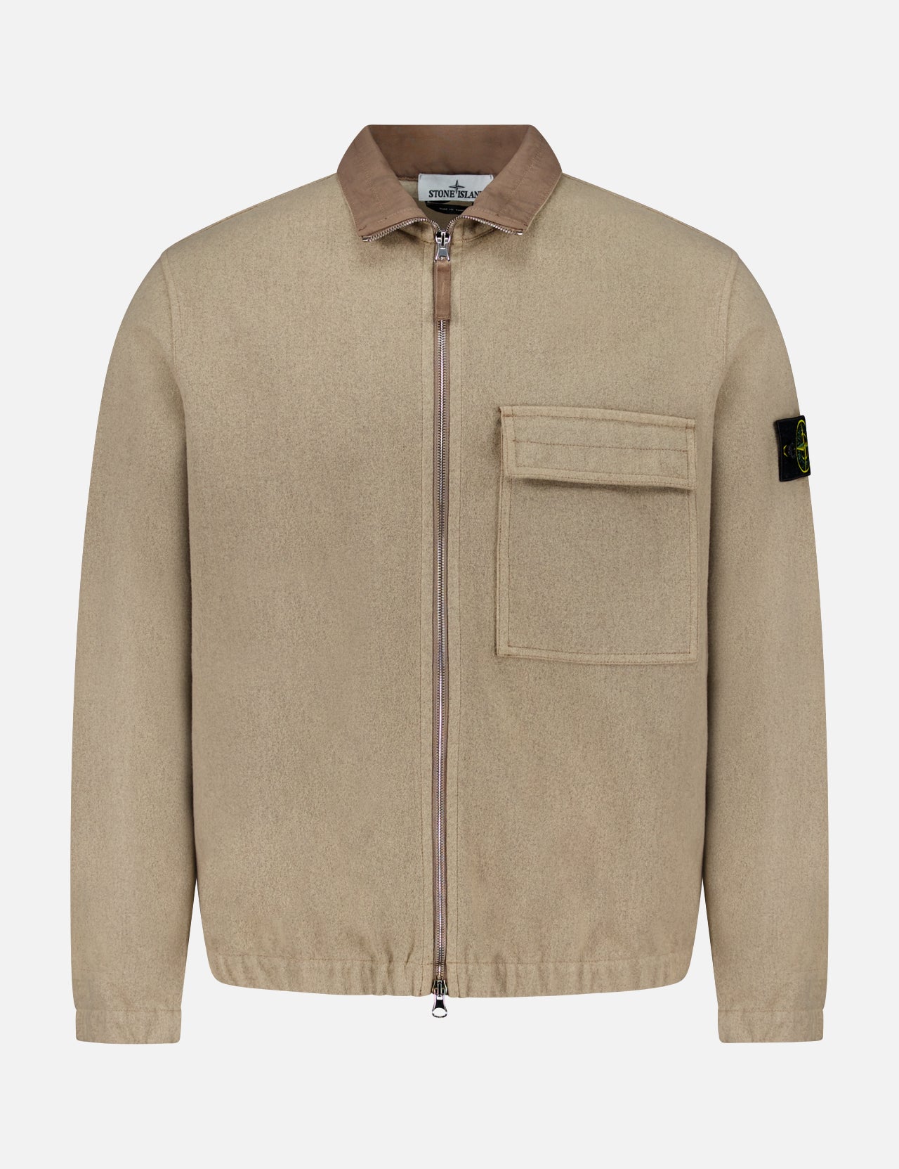 Stand Collar Zip Up Jacket by STONE ISLAND in beige, featuring a brown collar, large flap chest pocket, and black logo patch on the left sleeve, displayed against a plain white background—an iconic blend of streetwear and sportswear style.